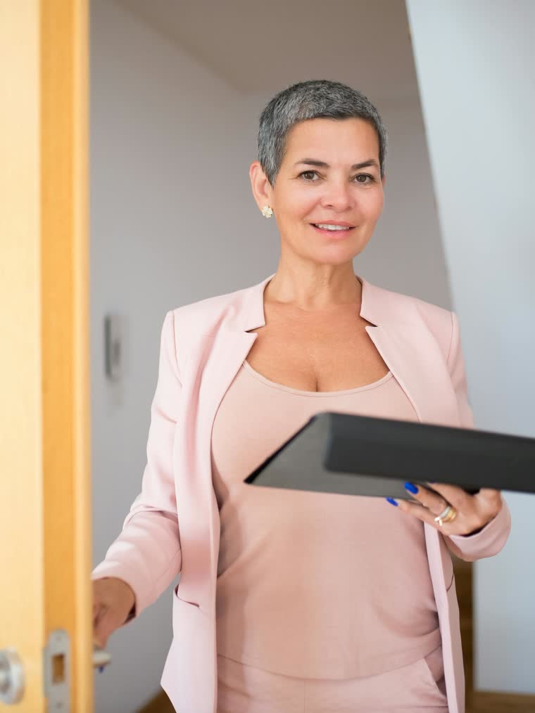 Confident business professional woman with an approachable expression.